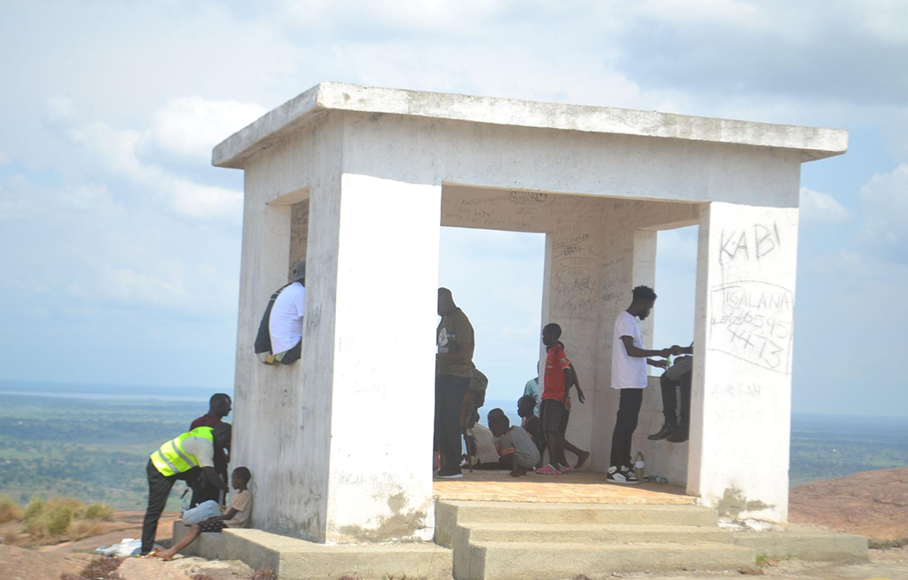 A team of tourists pitch camp in one of the resting shelters